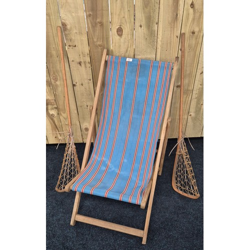 374 - Vintage deck chair together with Two vintage Lacrosse sticks with leather and cat gut heads [114cm l... 