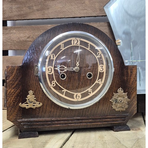 366 - Art Deco period frameless mirror together with an art Deco mantle clock with fitted military badges