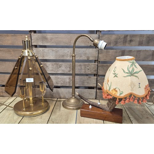 371 - A collection of three vintage Table lamps; 1970s three section brass desk lamp, antler based table l... 