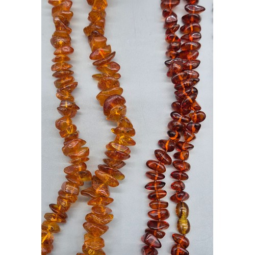 27 - A collection of five vintage amber necklaces. Varying sizes. [177.52grams]