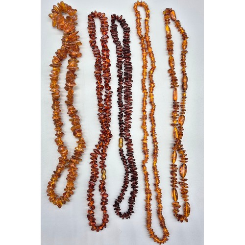 27 - A collection of five vintage amber necklaces. Varying sizes. [177.52grams]