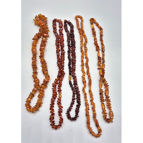 27 - A collection of five vintage amber necklaces. Varying sizes. [177.52grams]