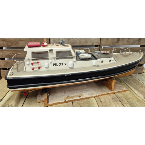 268 - Large Sanwa Remote control model boat on stand with original remote