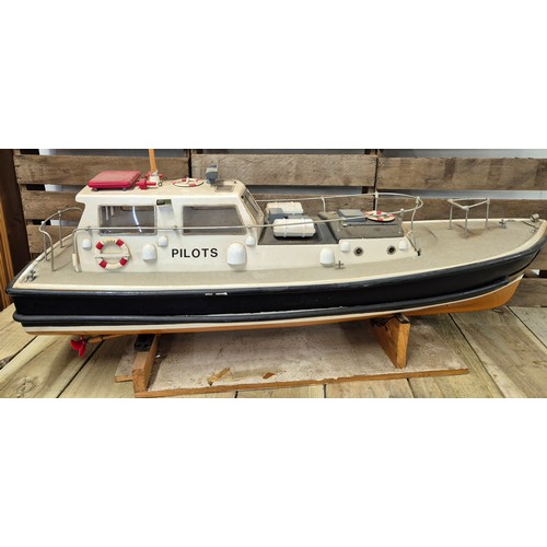 268 - Large Sanwa Remote control model boat on stand with original remote