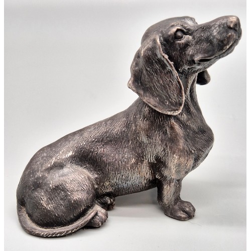 33 - Sheffield silver seated Dachshund sculpture. Silver filled. [8x9.5x4cm]