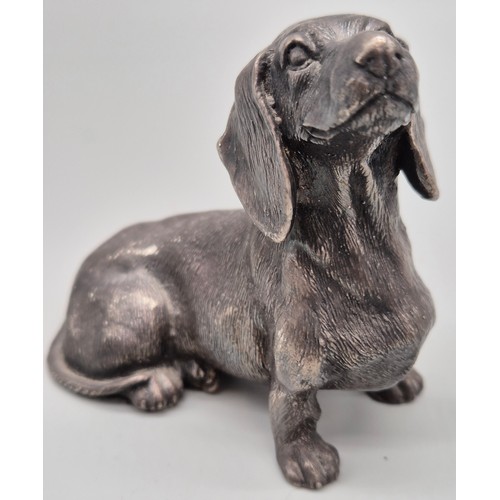 33 - Sheffield silver seated Dachshund sculpture. Silver filled. [8x9.5x4cm]