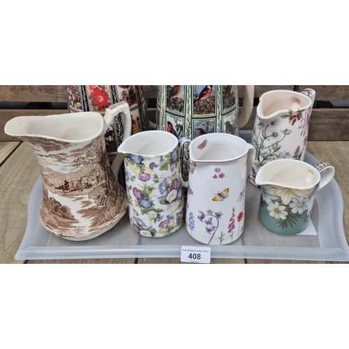 408 - A tray of porcelain water jugs & others; British wild birds jug, amber glade Derbyshire wilds flower... 