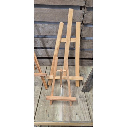 486 - A selection of four table top artist easels