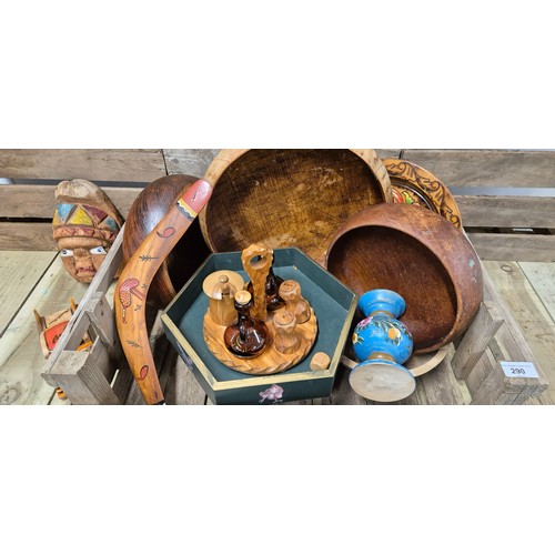 290 - A crate of wooden collectables; Treen bowls and various other items