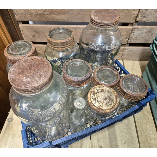 494 - A crate of tools, camping gas stoves; together with a crate of advertising glass jars