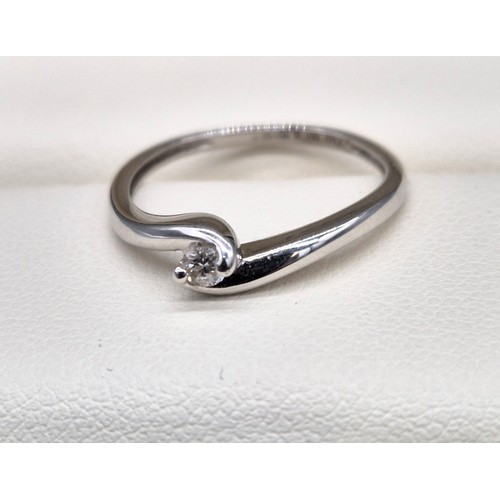 44 - 18ct white gold and diamond stone ring. [0.10ct round cut diamond] [1.84grams]