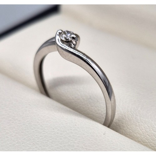 44 - 18ct white gold and diamond stone ring. [0.10ct round cut diamond] [1.84grams]