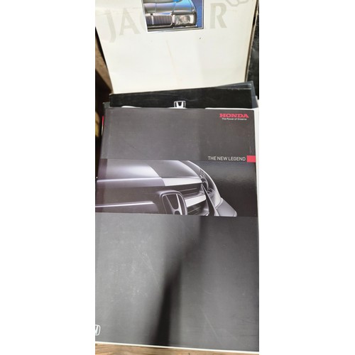 441 - A Crate of vintage car brochures to include Honda, Land Rover, Jaguar and many more