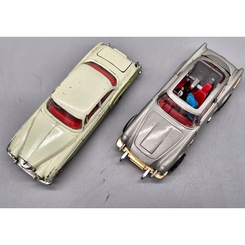 72 - Two Corgi car models; 007 James Bond Aston Martin DB5 with figures present and additional ejector fi... 