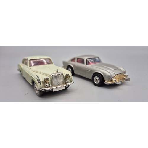 72 - Two Corgi car models; 007 James Bond Aston Martin DB5 with figures present and additional ejector fi... 