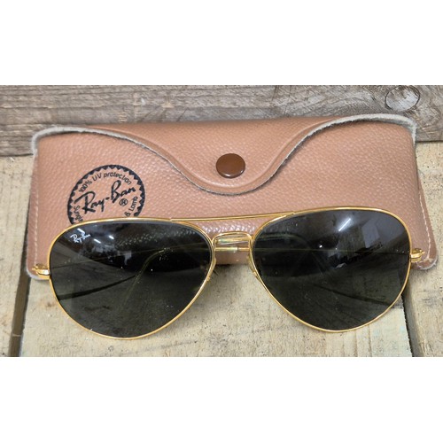 73 - Original pair of Ray Ban aviators, gold plated frames and comes with carry pouch.