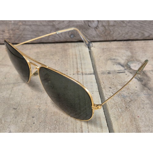 73 - Original pair of Ray Ban aviators, gold plated frames and comes with carry pouch.