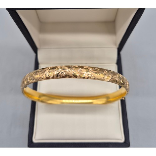 11 - 14ct yellow gold bangle. [11.31grams]
