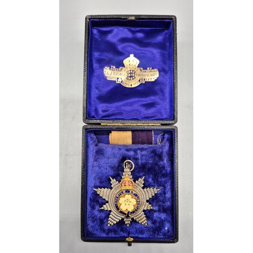 47 - A Boxed Primrose League order enamelled star medal with ribbon.