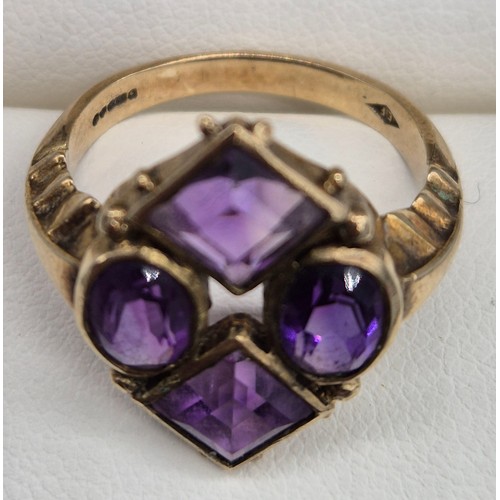 2 - 9ct yellow gold ladies ring fitted with four various cut amethyst gem stones, Emerald and oval cut s... 