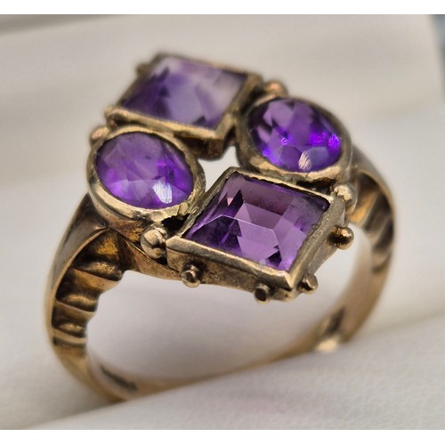 2 - 9ct yellow gold ladies ring fitted with four various cut amethyst gem stones, Emerald and oval cut s... 