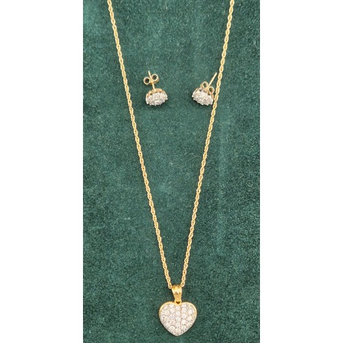 23 - 18ct yellow gold heart shaped pendant fitted with a cluster of round cut diamonds. 0.50ct. [4.69gram... 