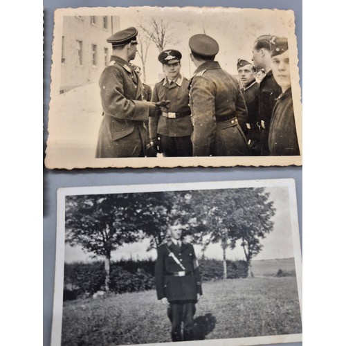 58 - A Collection of Genuine German Nazi WW2 Photographs; photograph of Officers conversating. Photograph... 