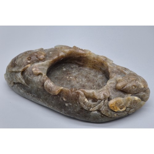 41 - A Chinese hand carved hardstone/ agate ink dish; detailed with carved Kio carp. [11.5cm length]