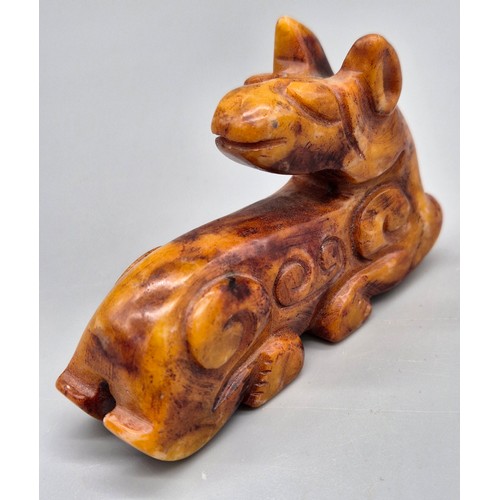 52 - Chinese hardstone hand carved sculpture of a dragon dog. [7.5cm length]