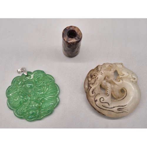 53 - Three Various Chinese hand carved sculptures; Green Jade dragon pendant with silver attachment, Drag... 