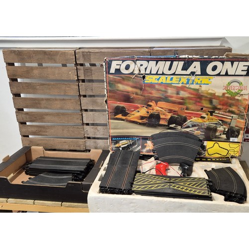 487 - Formula one scalextrics Silverstone track [ no cars] together with box of spare track