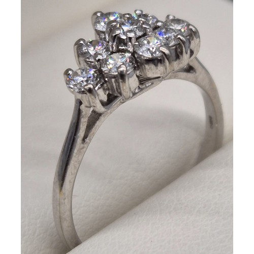 4 - 18ct white gold ladies ring fitted with .75ct diamond cluster. Round cut, brilliant White. [Ring siz... 