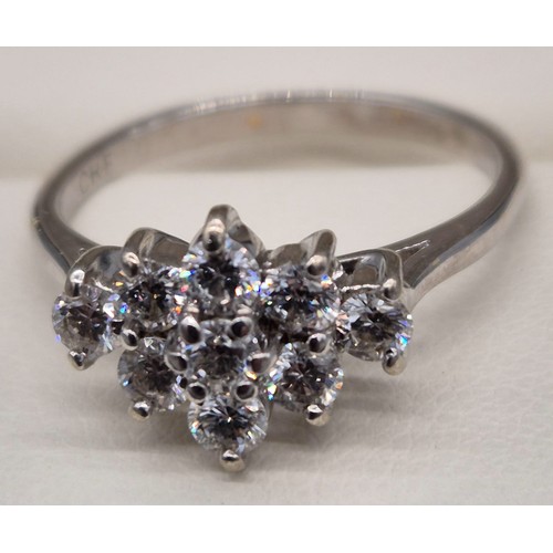 4 - 18ct white gold ladies ring fitted with .75ct diamond cluster. Round cut, brilliant White. [Ring siz... 