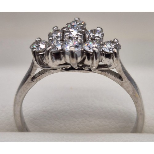 4 - 18ct white gold ladies ring fitted with .75ct diamond cluster. Round cut, brilliant White. [Ring siz... 