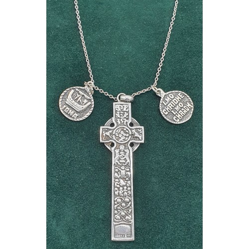 6 - Alexander Ritchie of Iona Celtic cross design pendant and two small Iona circular silver pendants. A... 