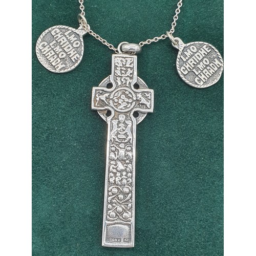 6 - Alexander Ritchie of Iona Celtic cross design pendant and two small Iona circular silver pendants. A... 