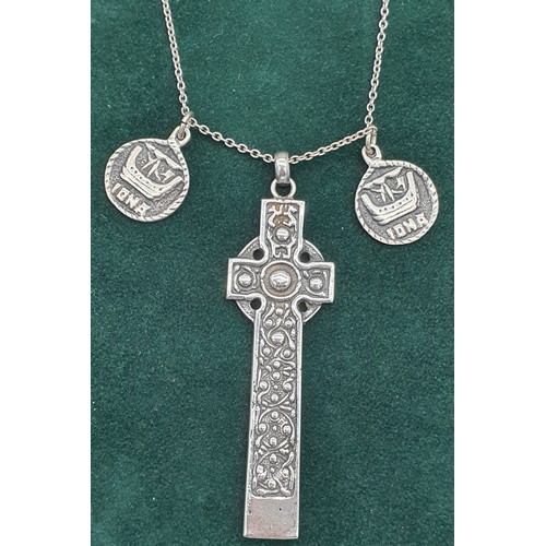 6 - Alexander Ritchie of Iona Celtic cross design pendant and two small Iona circular silver pendants. A... 