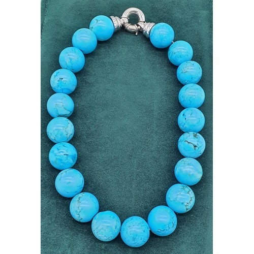 11 - A Vintage turquoise stone necklace with a 925 silver catch and clasp.