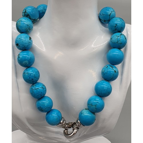 11 - A Vintage turquoise stone necklace with a 925 silver catch and clasp.