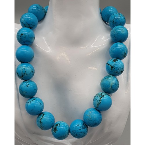 11 - A Vintage turquoise stone necklace with a 925 silver catch and clasp.