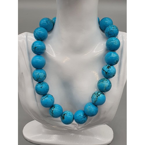 11 - A Vintage turquoise stone necklace with a 925 silver catch and clasp.