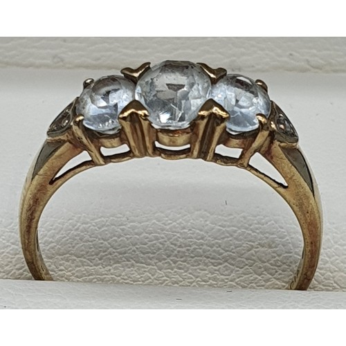 13 - 9ct yellow gold ring fitted with three oval cut aquamarine gem stones and two single round cut diamo... 