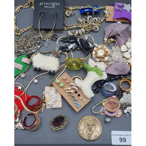 99 - A Tray of costume jewellery; art deco compact, various murano rings and other collectables