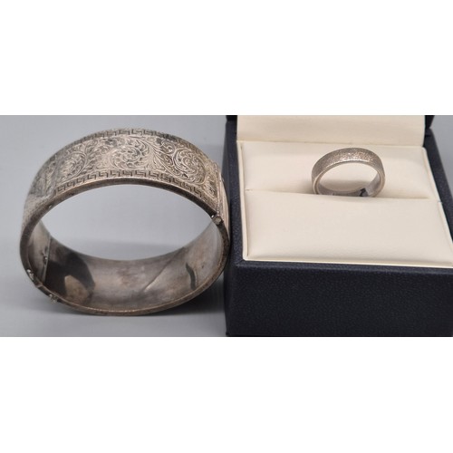 20 - 925 Silver Kit Heath band ring with box and certificate and Birmingham silver engraved bangle. [Ring... 