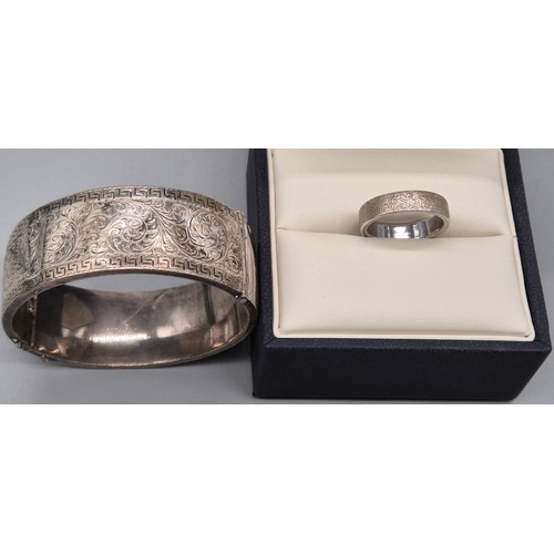 20 - 925 Silver Kit Heath band ring with box and certificate and Birmingham silver engraved bangle. [Ring... 