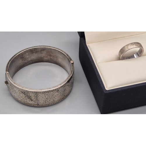 20 - 925 Silver Kit Heath band ring with box and certificate and Birmingham silver engraved bangle. [Ring... 