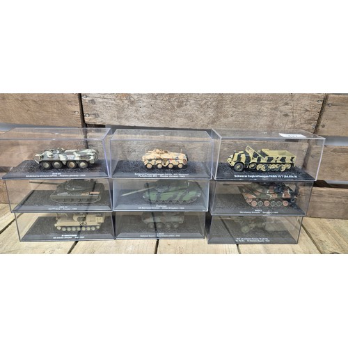 427 - A collection of nine military vehicles; tanks & military vehicles