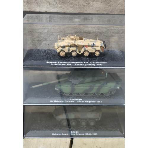 427 - A collection of nine military vehicles; tanks & military vehicles