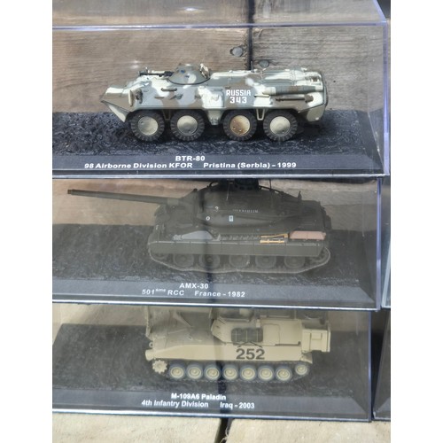427 - A collection of nine military vehicles; tanks & military vehicles