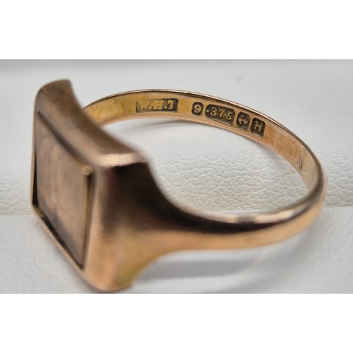 45 - Birmingham 9ct yellow gold and enamel Masonic swivel ring. [Ring size R] [3.97Grams]